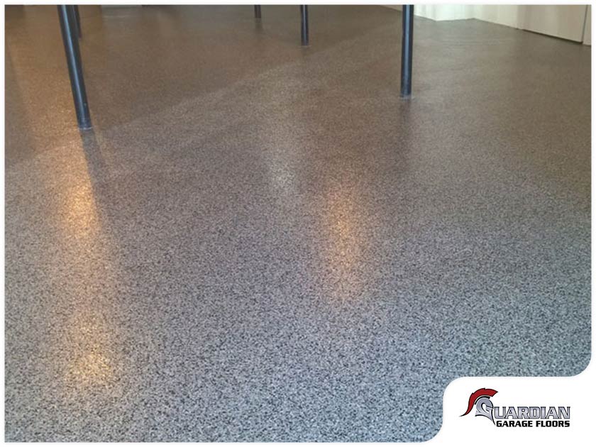 Concrete floor with polyaspartic coating
